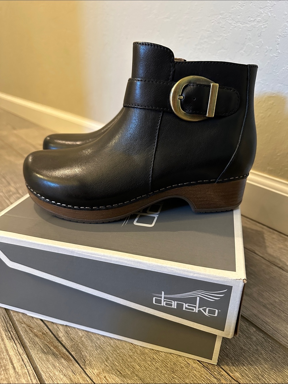 Dansko Brennan Calf Black Leather Ankle Bootie with Gold Buckle 37